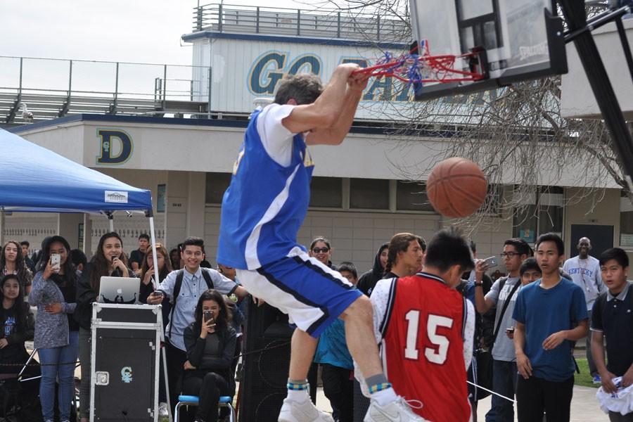 Mr. Bowman Shoots, Dunks Way to March Madness Titles