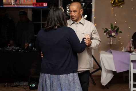 Jlee and her father dancing