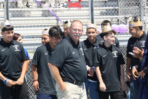 CI head football coach Gary Porter with some of his players at the Fall Sports Rally