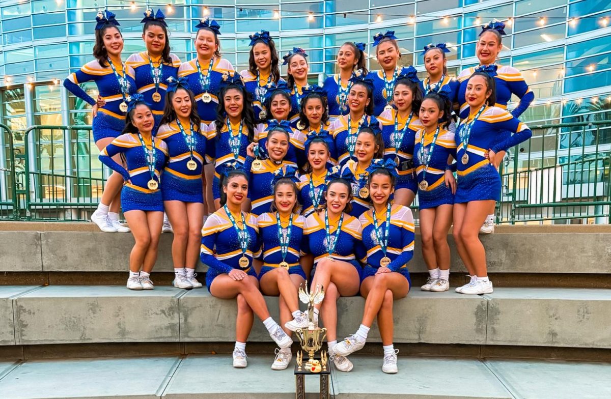 CI's cheer poses with national award 