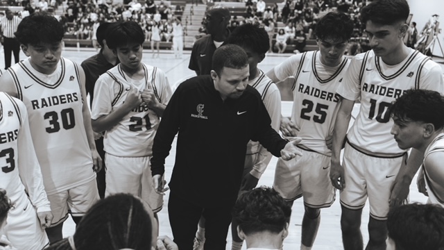 Coach Xavier Winbush with his team