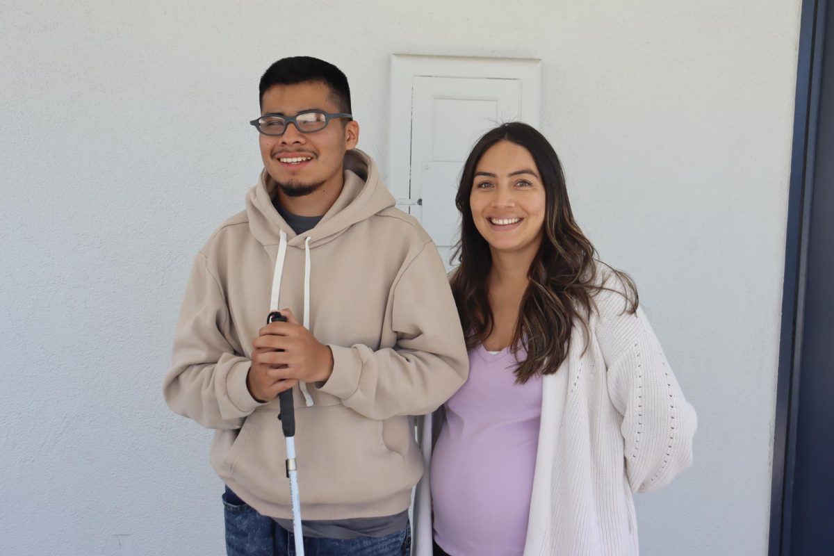 "NERVOUS, BUT EXCITED AND BRAVE." Joel Fernandez, senior, with his ESN teacher Mrs. Thalia Sandoval 